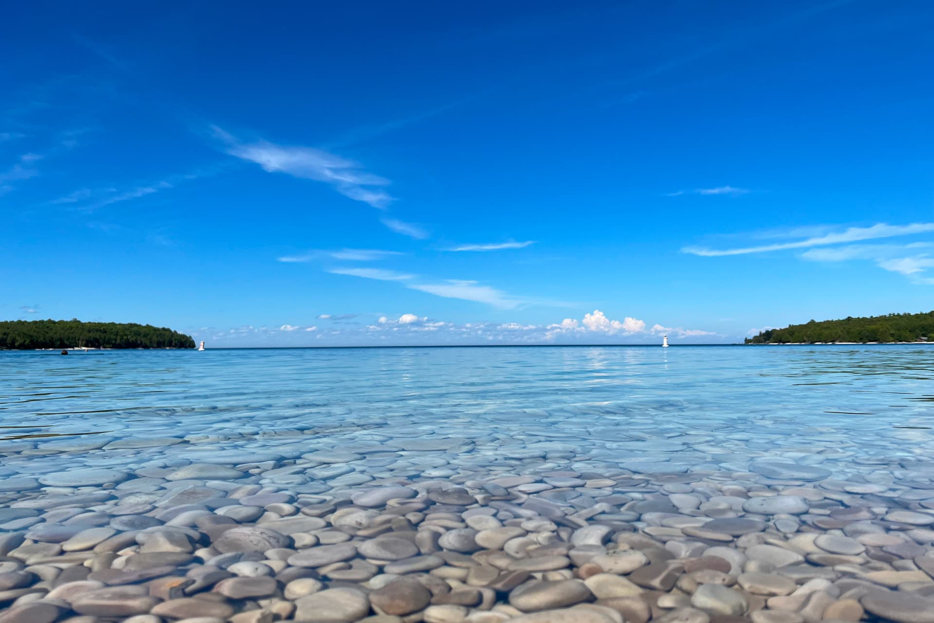 calm water over smooth stones