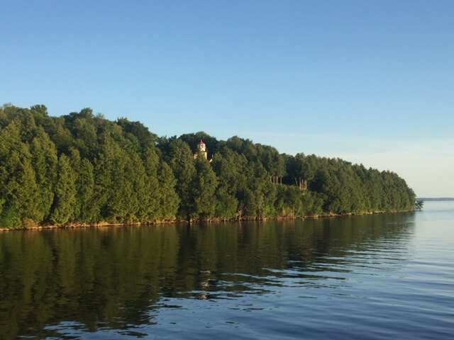 Eagle Bluff Lighthouse in Peninsula State Park is just visible above the tree line.